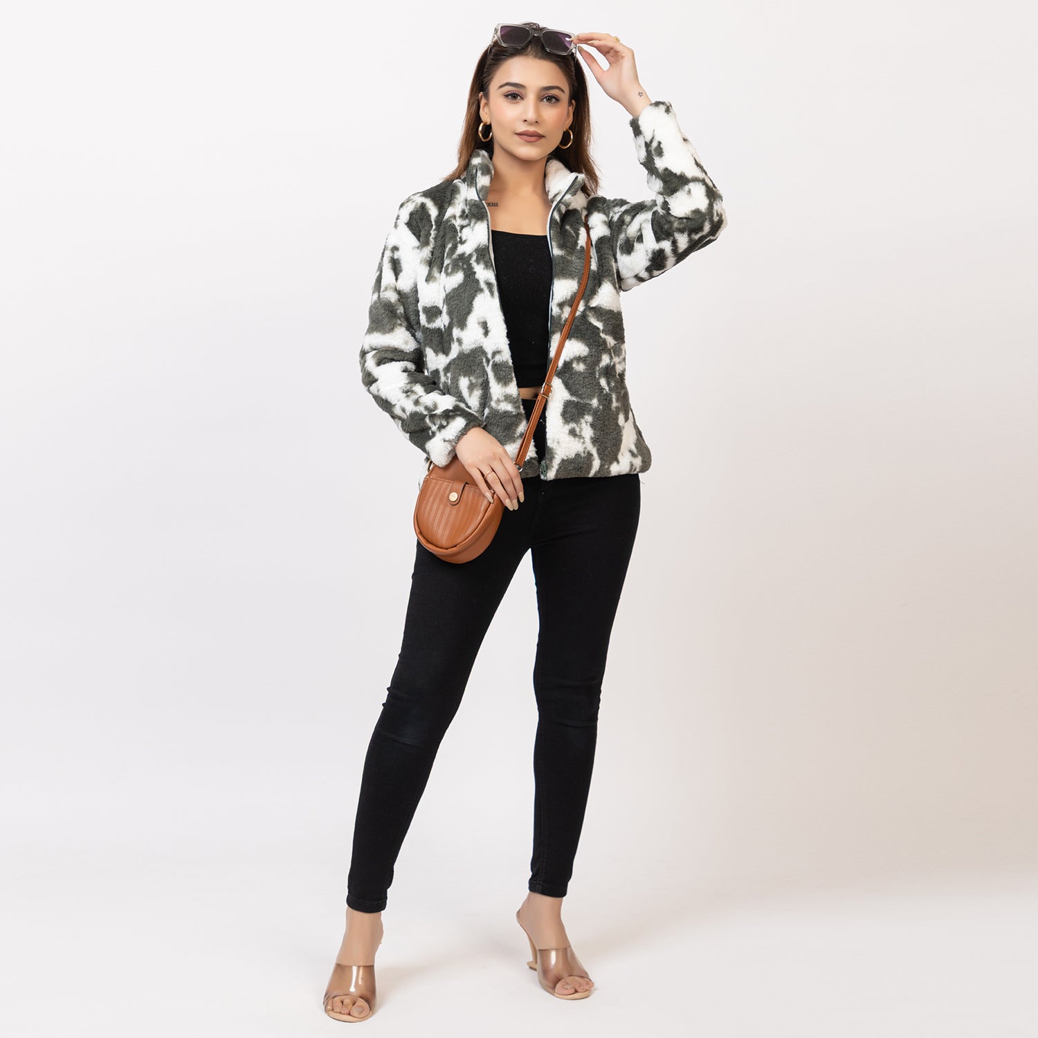 Woman wearing a tie-dye jacket on a white background Amoldo