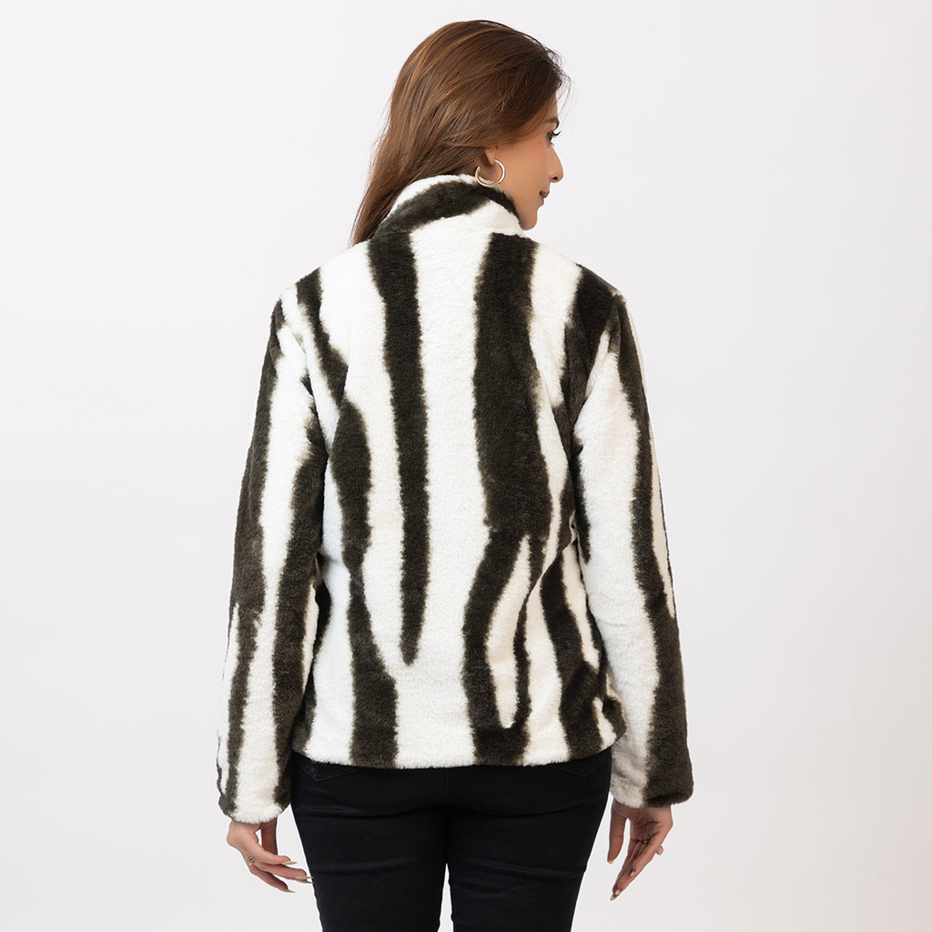 Woman wearing a zebra-striped jacket on a white background Amoldo
