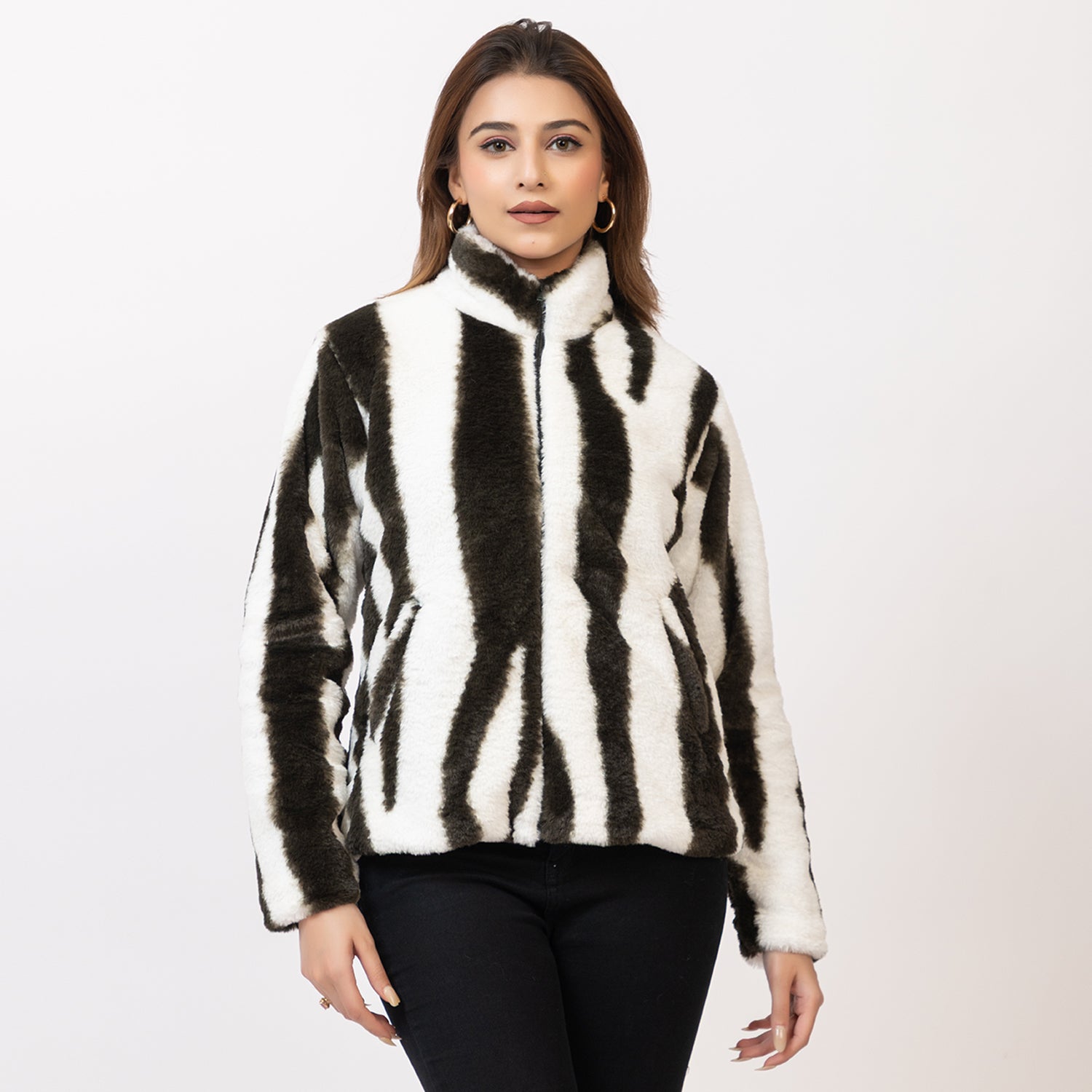 Woman wearing a zebra-striped jacket on a white background Amoldo