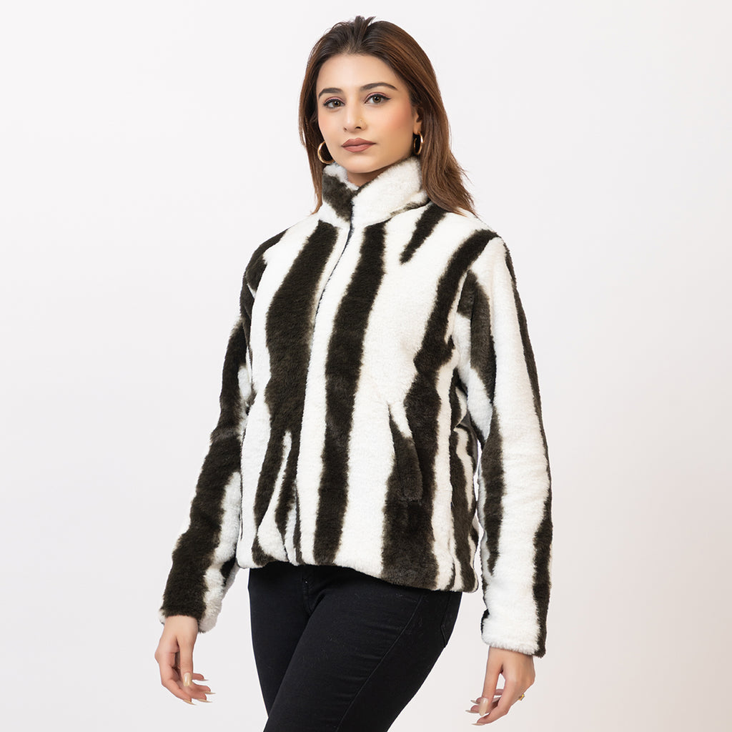 Woman wearing a zebra-striped jacket on a white background Amoldo
