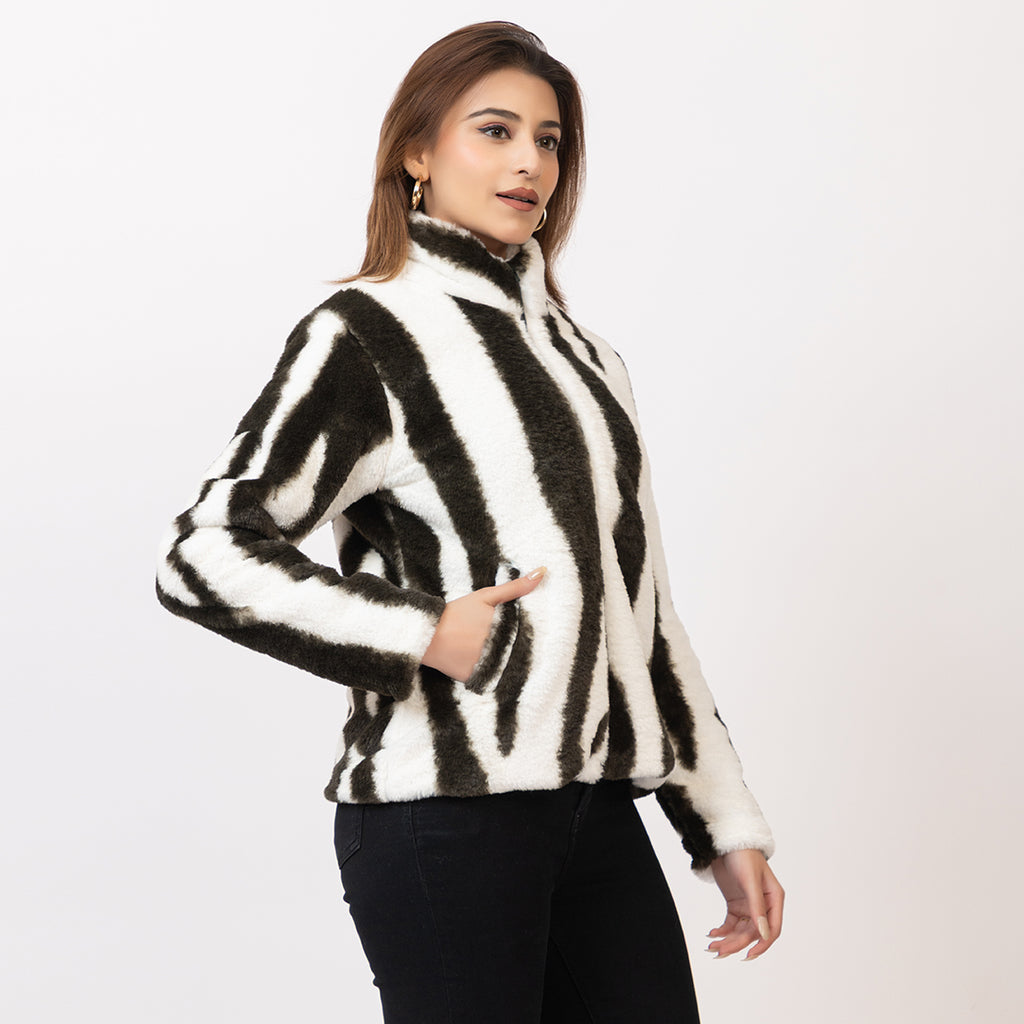Woman wearing a zebra-striped jacket on a white background Amoldo
