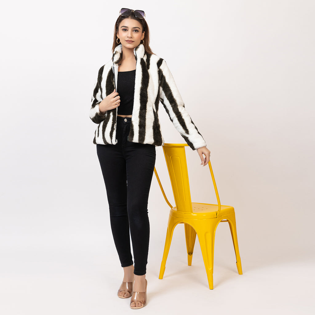 Woman wearing a zebra-striped jacket on a white background Amoldo
