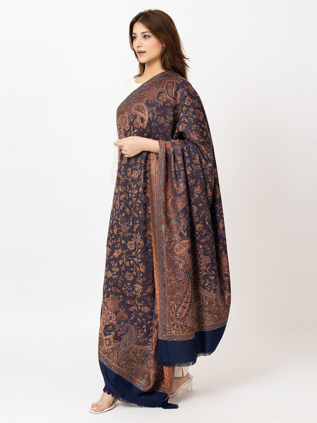 Amoldo Woman wearing a patterned dress on a white background