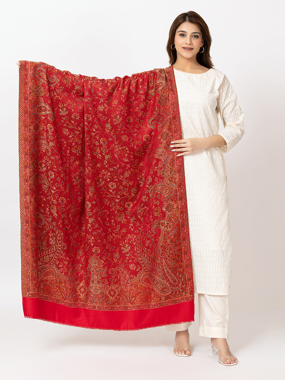 Amoldo Woman holding a red patterned scarf against a white background