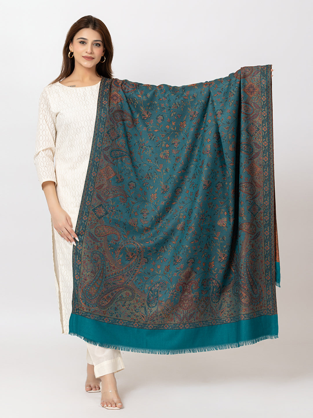  Amoldo Woman holding a large blue patterned scarf against a white background